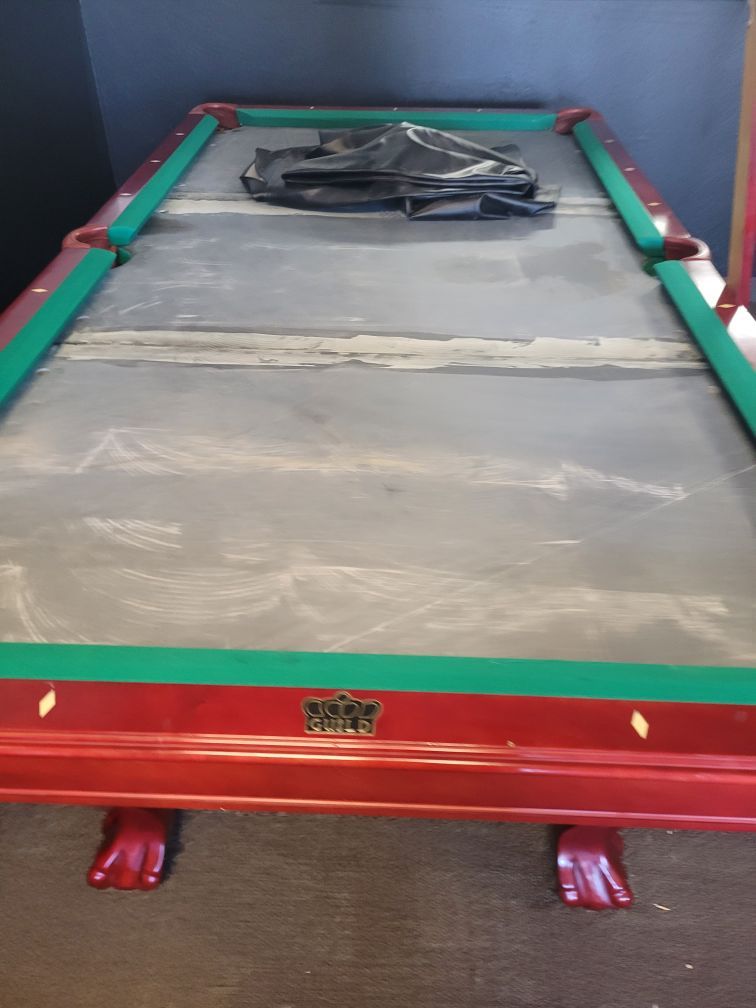 Crown mahogany pool table with ball-and-claw legs